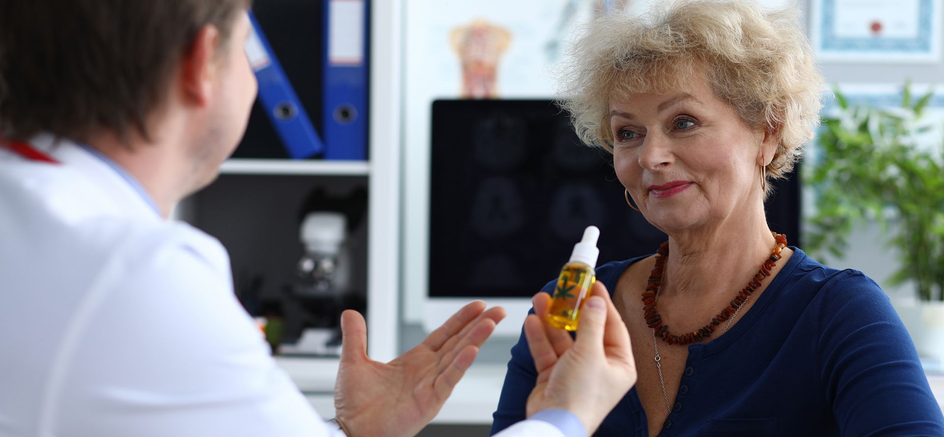 Doctor Recommends To Senior Woman CBD Oil.