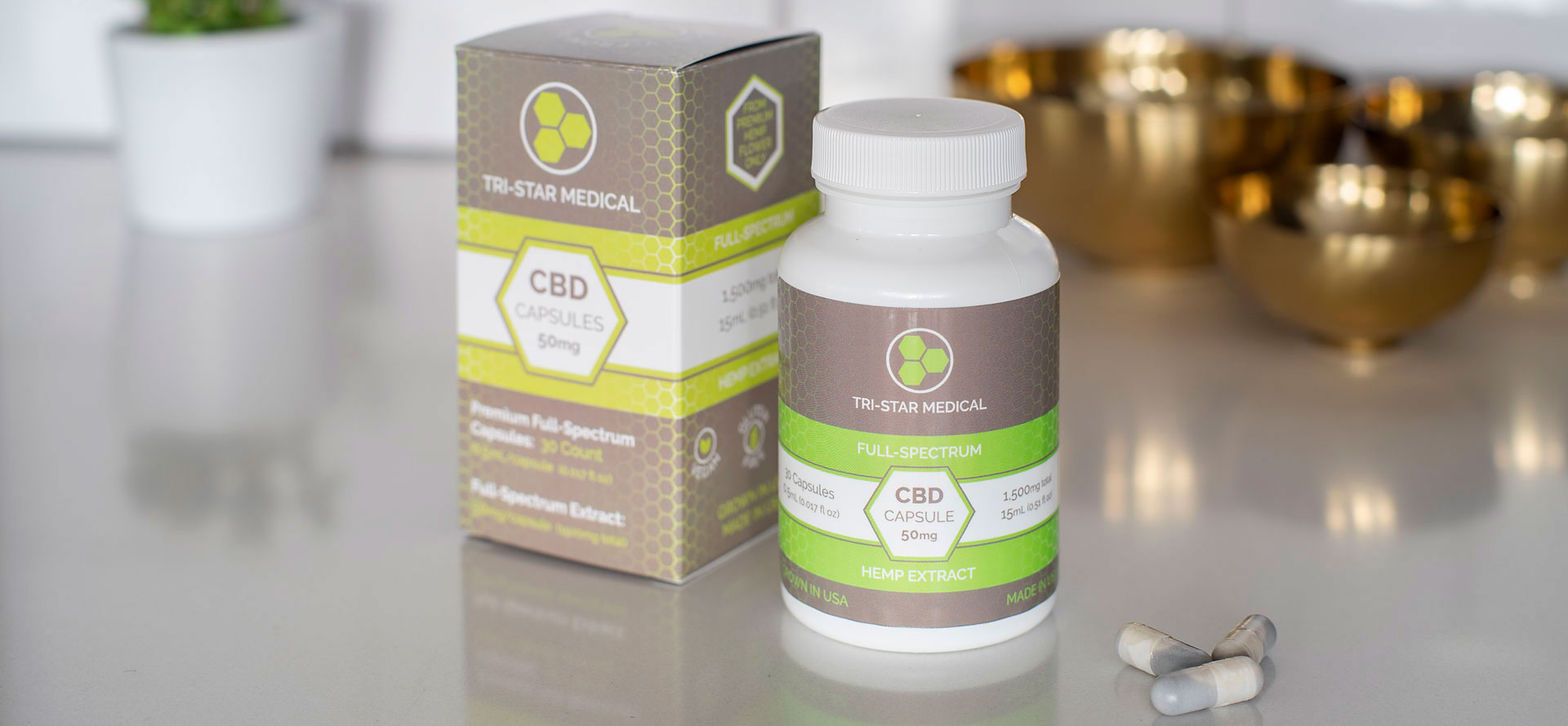 Full-spectrum CBD Capsules on table.